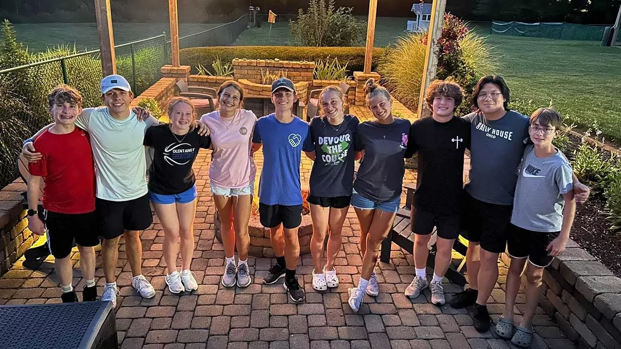 Group of kids smiling outdoors